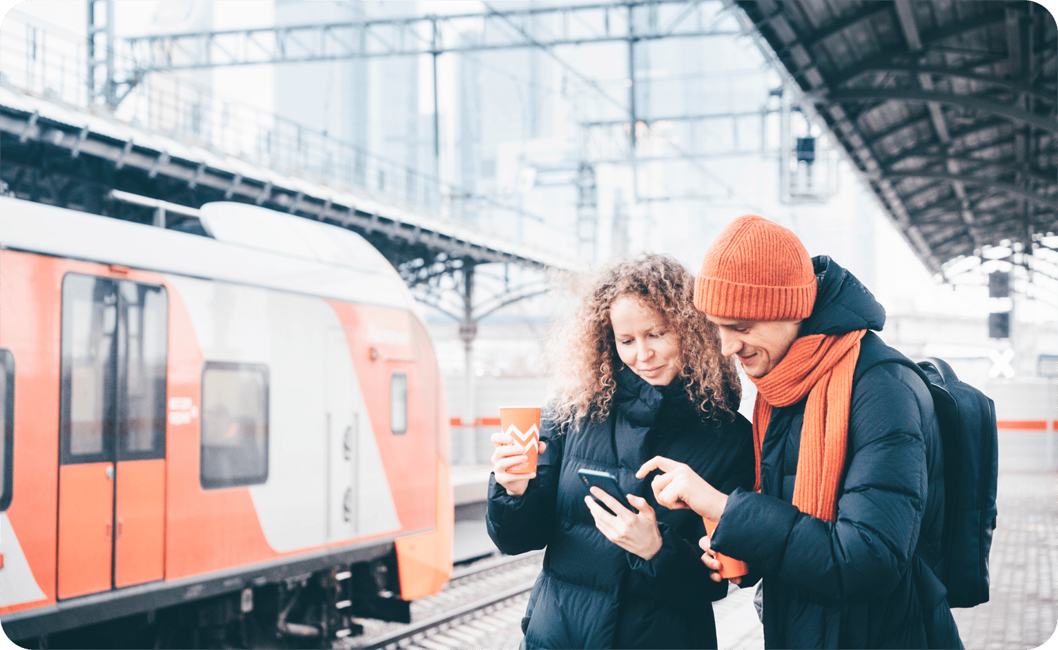 couple-checking-info-and-waiting-for-the-train-at-2025-01-09-02-51-16-utc copy